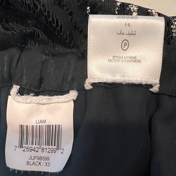 Sexy & Sophisticated BCBGMaxAzria Black Lace Detail Jumpsuit with Pockets - Picture 10 of 10